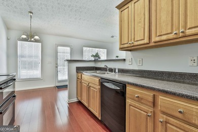 Welcome to this adorable and inviting 3-bedroom, 2-bath on Summergrove Golf Club in Georgia - for sale on GolfHomes.com, golf home, golf lot