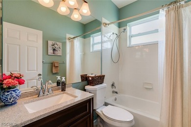 Beautifully updated single-family home located in the gated on Gateway Golf and Country Club in Florida - for sale on GolfHomes.com, golf home, golf lot