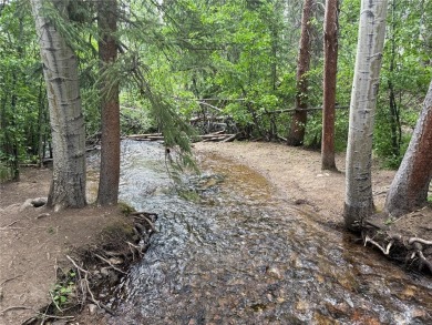 Discover the beauty and seclusion of Lot 59, a rare opportunity on The River Course At Keystone in Colorado - for sale on GolfHomes.com, golf home, golf lot