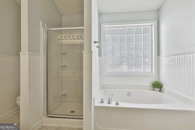 Welcome to this adorable and inviting 3-bedroom, 2-bath on Summergrove Golf Club in Georgia - for sale on GolfHomes.com, golf home, golf lot