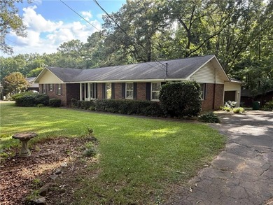 This 4 bedroom, 3 bath ranch has perfect bones and a great floor on Cherokee Golf and Country Club in Georgia - for sale on GolfHomes.com, golf home, golf lot