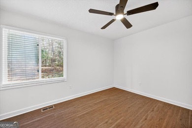 This 3-bedroom, 2-bath home has been completely updated from top on Golf Club of Macon in Georgia - for sale on GolfHomes.com, golf home, golf lot