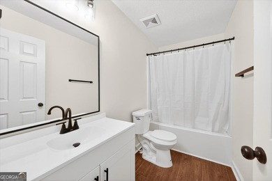 This 3-bedroom, 2-bath home has been completely updated from top on Golf Club of Macon in Georgia - for sale on GolfHomes.com, golf home, golf lot