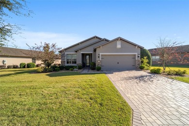 Step into a world of refined comfort and natural beauty in this on Stone Creek Golf Club in Florida - for sale on GolfHomes.com, golf home, golf lot