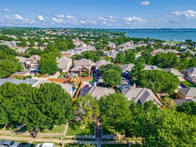 Step into a true showstopper in The Shores by Ray Hubbard. This on The Shores Country Club in Texas - for sale on GolfHomes.com, golf home, golf lot