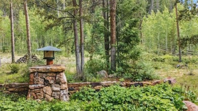 Discover the beauty and seclusion of Lot 59, a rare opportunity on The River Course At Keystone in Colorado - for sale on GolfHomes.com, golf home, golf lot