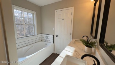 Beautifully Remodeled. Detached townhome in Aspen Commons on Country Club of the Poconos Golf Course in Pennsylvania - for sale on GolfHomes.com, golf home, golf lot