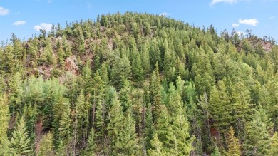 Discover the beauty and seclusion of Lot 59, a rare opportunity on The River Course At Keystone in Colorado - for sale on GolfHomes.com, golf home, golf lot