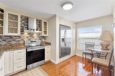 Welcome to a serene 55+ Bonaire Village getaway in Delray Beach! on Marina Lakes Golf Course in Florida - for sale on GolfHomes.com, golf home, golf lot