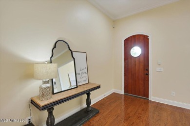 CLICK ON VIRTUAL TOURWelcome to this beautifully updated home on Lake Caroline Golf Club in Mississippi - for sale on GolfHomes.com, golf home, golf lot