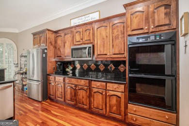 STUNNING BRICK HOME beautifully maintained and nestled on 2.65 on The Orchard Golf and Country Club in Georgia - for sale on GolfHomes.com, golf home, golf lot