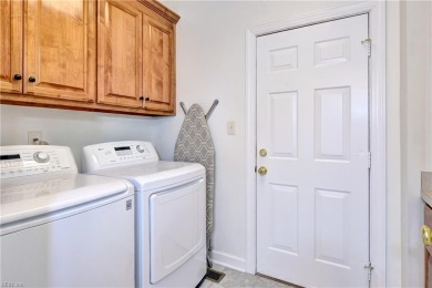 Set against a serene, park-like backdrop with a long view of the on The Tradition Golf Club At Stonehouse in Virginia - for sale on GolfHomes.com, golf home, golf lot