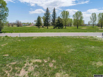 Adjacent to #7 fairway.  Buyer must complete sidewalk.  Various on Riverton Country Club in Wyoming - for sale on GolfHomes.com, golf home, golf lot