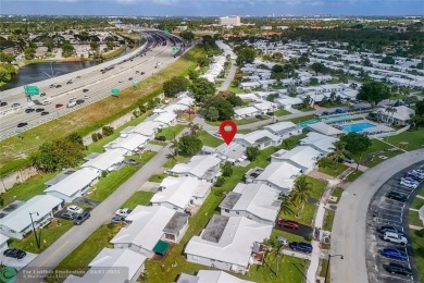 With a brand new roof and all hurricane impact windows... this on Leisureville Community Association in Florida - for sale on GolfHomes.com, golf home, golf lot
