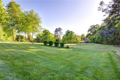 Set against a serene, park-like backdrop with a long view of the on The Tradition Golf Club At Stonehouse in Virginia - for sale on GolfHomes.com, golf home, golf lot