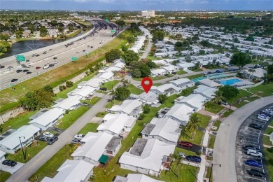 No Land Lease!  With a brand new roof and all hurricane impact on Leisureville Community Association in Florida - for sale on GolfHomes.com, golf home, golf lot