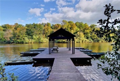 Set against a serene, park-like backdrop with a long view of the on The Tradition Golf Club At Stonehouse in Virginia - for sale on GolfHomes.com, golf home, golf lot