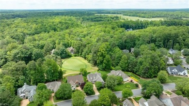 Set against a serene, park-like backdrop with a long view of the on The Tradition Golf Club At Stonehouse in Virginia - for sale on GolfHomes.com, golf home, golf lot