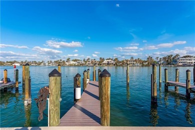 Discover the epitome of Naples waterfront living at Yacht Harbor on The Moorings Country Club in Florida - for sale on GolfHomes.com, golf home, golf lot