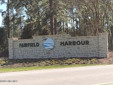 Wooded parcel with varied view of Northwest Creek. Located in on Harbour Point Golf Club in North Carolina - for sale on GolfHomes.com, golf home, golf lot