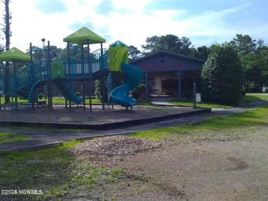 Wooded parcel with varied view of Northwest Creek. Located in on Harbour Point Golf Club in North Carolina - for sale on GolfHomes.com, golf home, golf lot