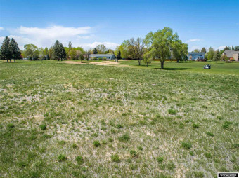This lot is along #7 fairway.  Buyer must complete sidewalk on Riverton Country Club in Wyoming - for sale on GolfHomes.com, golf home, golf lot