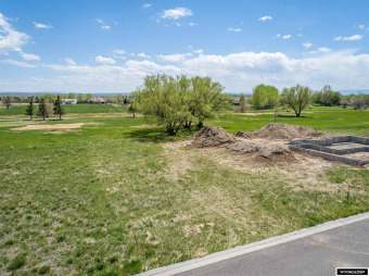 Located by #4 fairway.  Buyer must complete sidewalk.  Various on Riverton Country Club in Wyoming - for sale on GolfHomes.com, golf home, golf lot