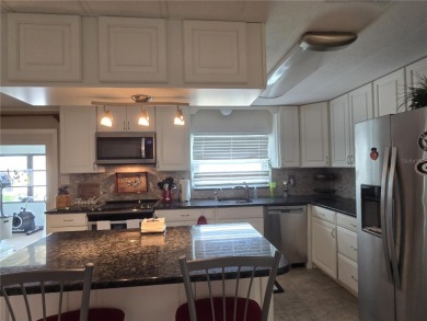 ZELLWOOD STATION BEAUTIFUL GOLF COURSE VIEW This 2-bedroom 2 on Zellwood Station Country Club in Florida - for sale on GolfHomes.com, golf home, golf lot