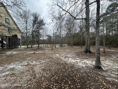 Beautiful waterfront lot offering stunning views and deep-water on Diamondhead Country Club in Mississippi - for sale on GolfHomes.com, golf home, golf lot