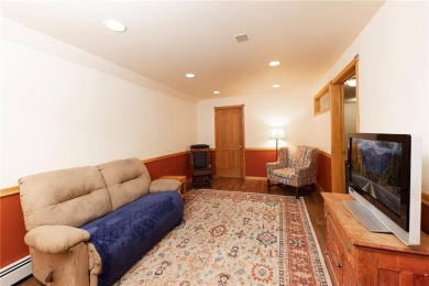 This quintessential Breckenridge home is nestled on a on Breckenridge Golf Club in Colorado - for sale on GolfHomes.com, golf home, golf lot
