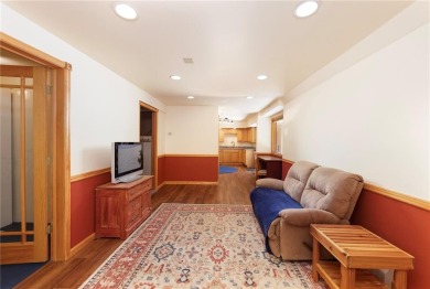 This quintessential Breckenridge home is nestled on a on Breckenridge Golf Club in Colorado - for sale on GolfHomes.com, golf home, golf lot