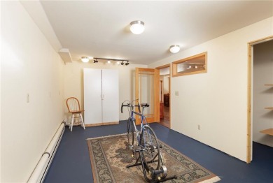 This quintessential Breckenridge home is nestled on a on Breckenridge Golf Club in Colorado - for sale on GolfHomes.com, golf home, golf lot