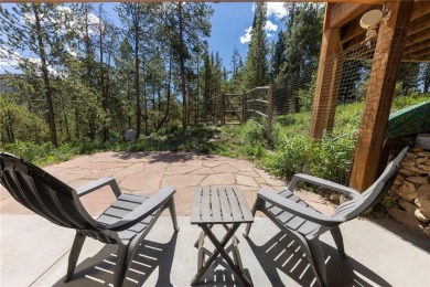 This quintessential Breckenridge home is nestled on a on Breckenridge Golf Club in Colorado - for sale on GolfHomes.com, golf home, golf lot