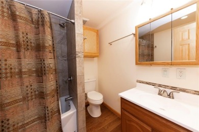 This quintessential Breckenridge home is nestled on a on Breckenridge Golf Club in Colorado - for sale on GolfHomes.com, golf home, golf lot