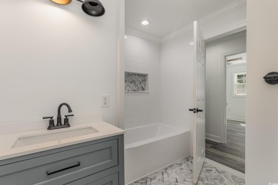 LOOK!!! PRICE REDUCTION! LOWEST PRICED 4 BEDROOM HOME IN on Wedgefield Plantation Golf Club in South Carolina - for sale on GolfHomes.com, golf home, golf lot