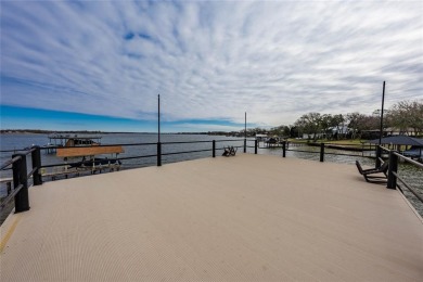 This fresh, modern lakehome redesign lends itself to a french on Star Harbor Golf Club in Texas - for sale on GolfHomes.com, golf home, golf lot