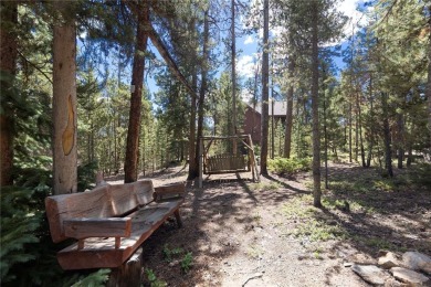 This quintessential Breckenridge home is nestled on a on Breckenridge Golf Club in Colorado - for sale on GolfHomes.com, golf home, golf lot
