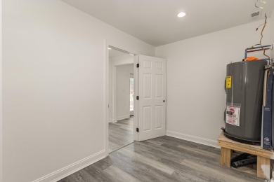 LOOK!!! PRICE REDUCTION! LOWEST PRICED 4 BEDROOM HOME IN on Wedgefield Plantation Golf Club in South Carolina - for sale on GolfHomes.com, golf home, golf lot