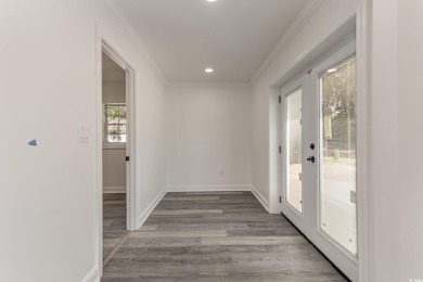 LOOK!!! PRICE REDUCTION! LOWEST PRICED 4 BEDROOM HOME IN on Wedgefield Plantation Golf Club in South Carolina - for sale on GolfHomes.com, golf home, golf lot