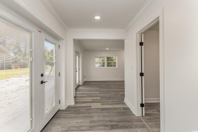 LOOK!!! PRICE REDUCTION! LOWEST PRICED 4 BEDROOM HOME IN on Wedgefield Plantation Golf Club in South Carolina - for sale on GolfHomes.com, golf home, golf lot