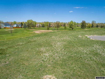 This lot is located along the #7 fairway.  Buyer must complete on Riverton Country Club in Wyoming - for sale on GolfHomes.com, golf home, golf lot