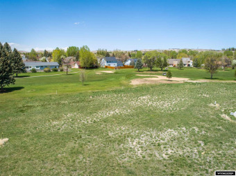 This lot is located along the #7 fairway.  Buyer must complete on Riverton Country Club in Wyoming - for sale on GolfHomes.com, golf home, golf lot