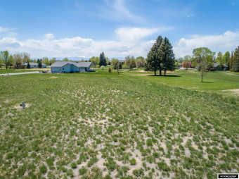 This lot is next to #7 fairway.  Buyer must complete sidewalk on Riverton Country Club in Wyoming - for sale on GolfHomes.com, golf home, golf lot
