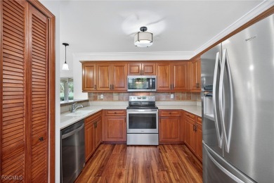 Nestled on the desirable Grand Palm Drive, this spectacular on Estero Country Club in Florida - for sale on GolfHomes.com, golf home, golf lot