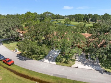 This exceptional end-unit townhome is strategically located on on The Grand Club - Pine Lakes Course in Florida - for sale on GolfHomes.com, golf home, golf lot