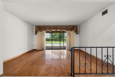 SPACIOUS POOL HOME OVERLOOKING GOLF COURSE IN LAKE SUZY on Kingsway Country Club in Florida - for sale on GolfHomes.com, golf home, golf lot