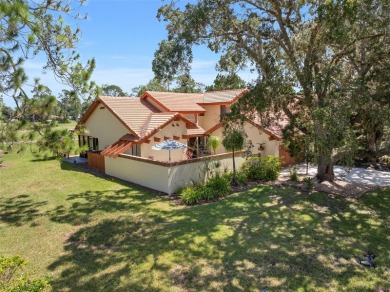 This exceptional end-unit townhome is strategically located on on The Grand Club - Pine Lakes Course in Florida - for sale on GolfHomes.com, golf home, golf lot