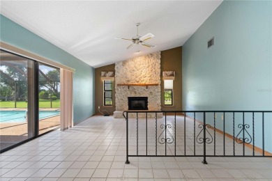 SPACIOUS POOL HOME OVERLOOKING GOLF COURSE IN LAKE SUZY on Kingsway Country Club in Florida - for sale on GolfHomes.com, golf home, golf lot