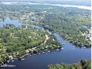 Wooded lot across the street from waterfront property on on Harbour Point Golf Club in North Carolina - for sale on GolfHomes.com, golf home, golf lot