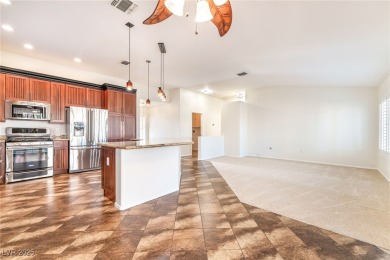 THIS STUNNING AGE RESTRICTED TWO BEDROOM SINGLE STORY HOME IN on Desert Willow Golf Course in Nevada - for sale on GolfHomes.com, golf home, golf lot